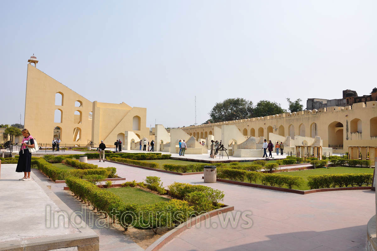 There are the big trash bins and the low trimmed shrubs inside Jantar Mantar