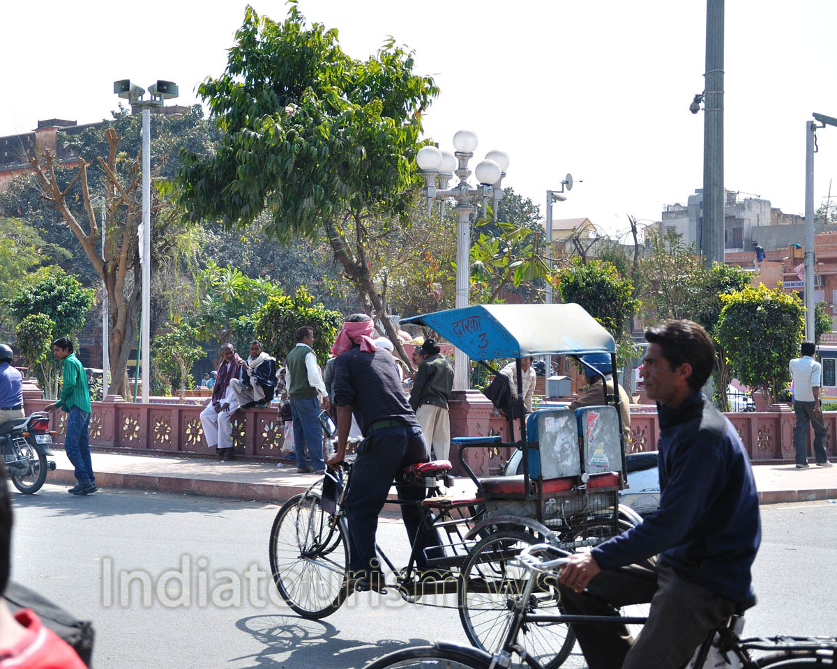 cycle rickshaw on the street near New Gate