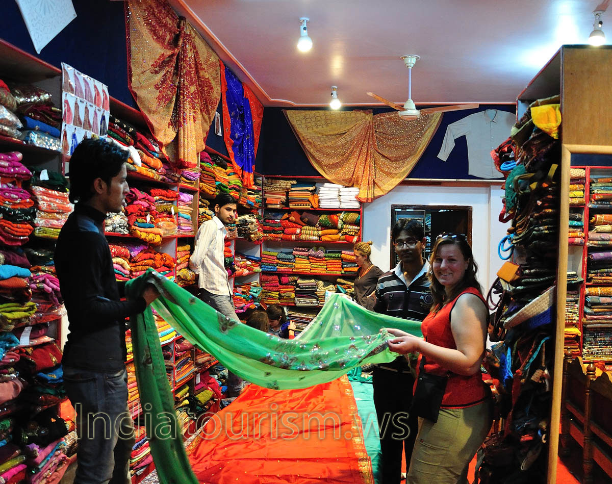 Store employees help us to choose sewing products