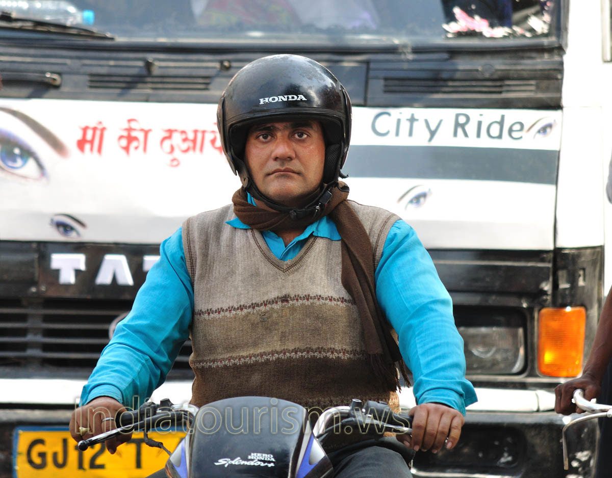 faces of Jaipur: motorcyclist in helmet