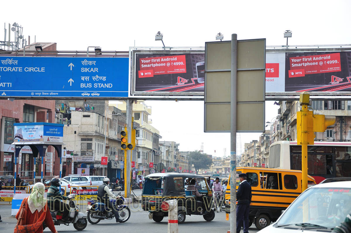 crossroad with a lot of traffic near Ajmeri Gate