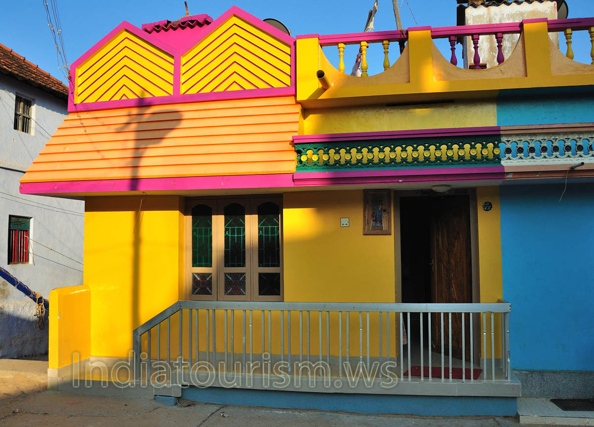 orange house with crimson stripes