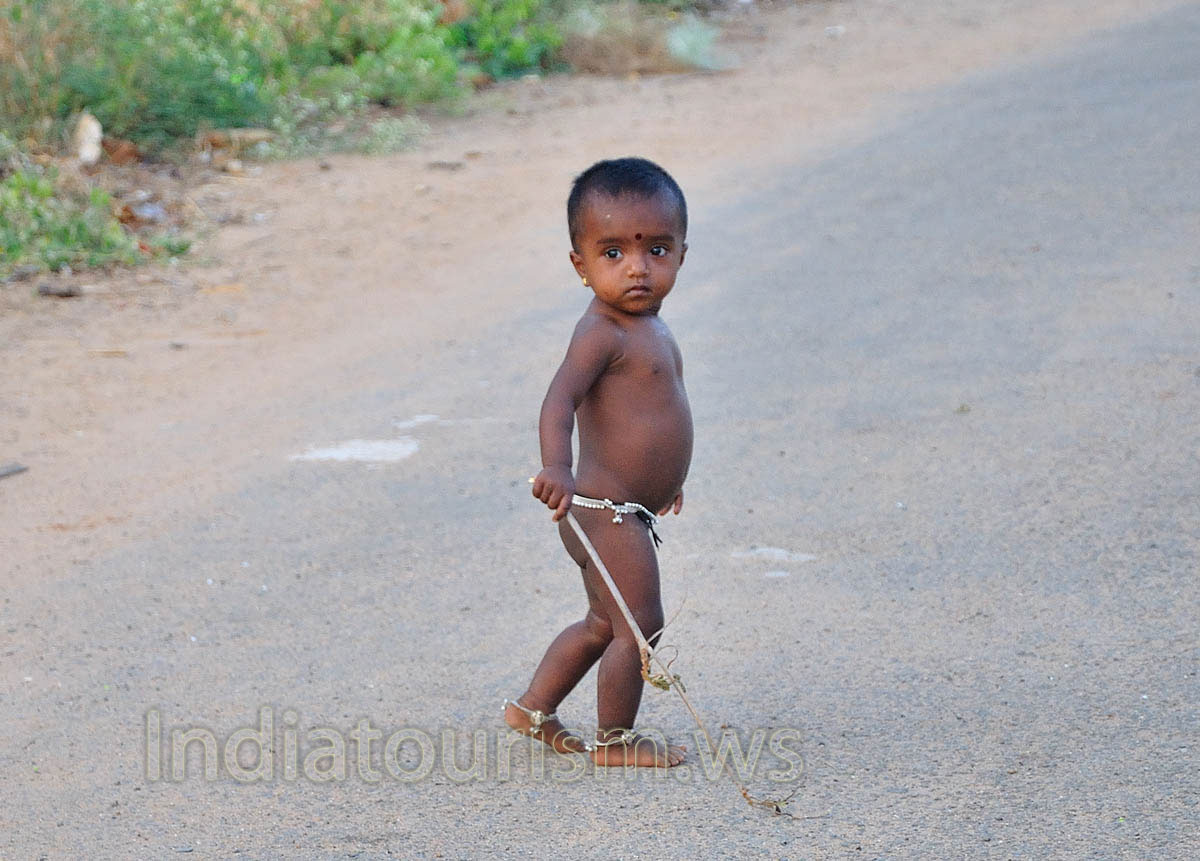 two years old indian girl with decorations