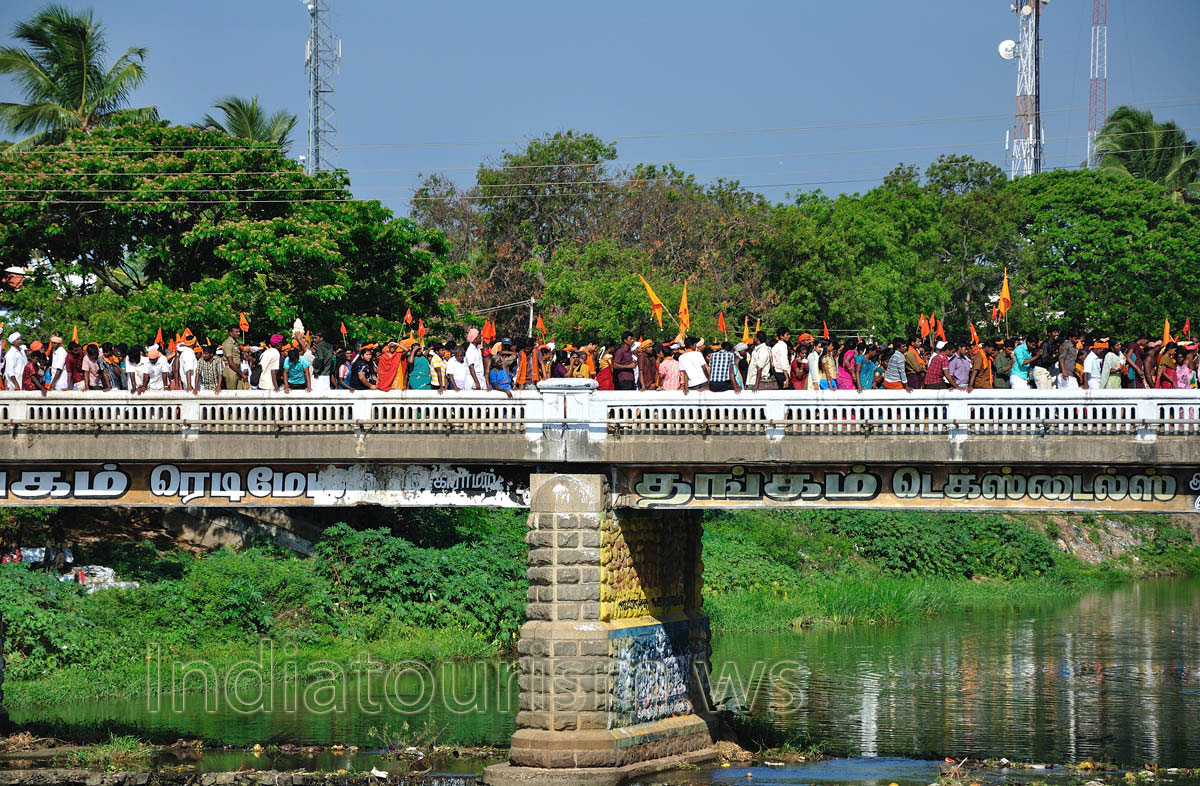 people holding in their hands orange flags