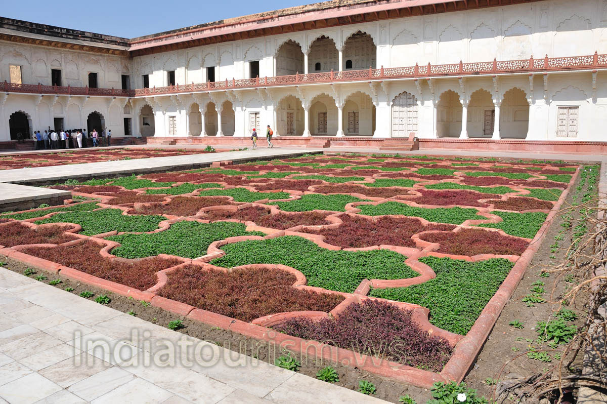 double storied red sandstone building finely plastered in white lime