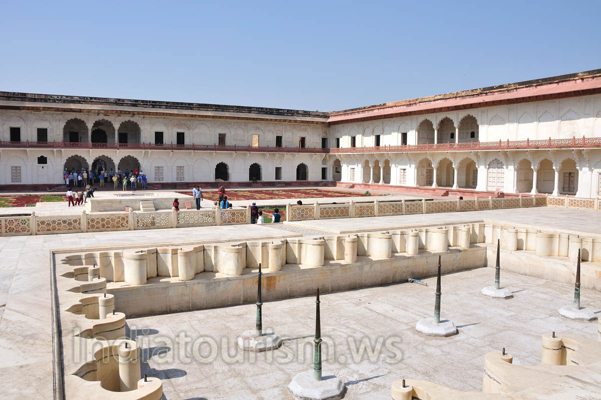 this fountain creates a rainbow when filled with colored water
