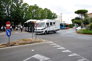 An intersection is in front of the bus station
