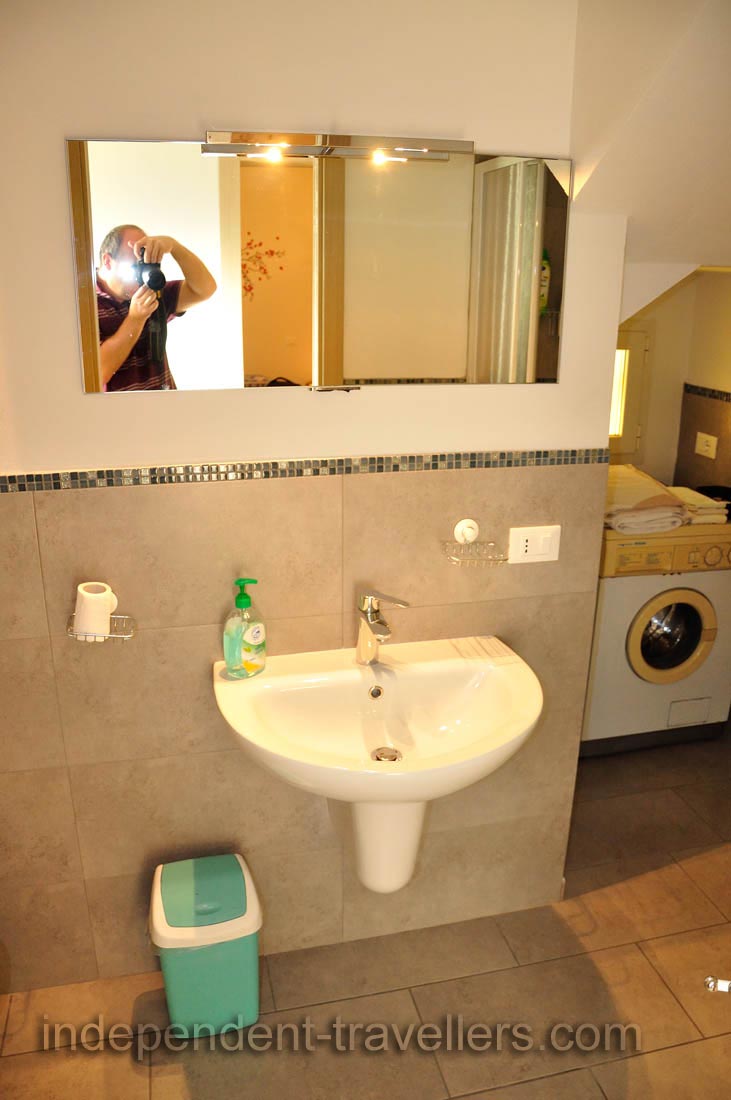 The wash basin is in the bathroom of our apartment