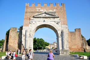The view of the Arch of Augustus from the side of historic city center