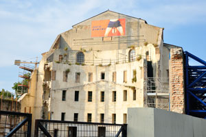 A funny advertisement on top of the theatre of Amintore Galli reads “Greetings from Rimini”