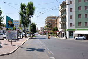 View of the Dante Alighieri street from the main entrance of Rimini railway station