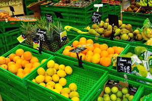 Oranges, pineapples and lemons in the Coop grocery