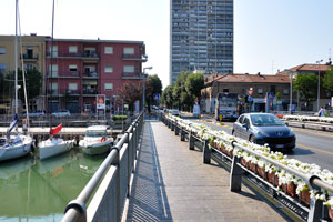 A pedestrian sidewalk along the bridge of “Ponte della Resistenza”