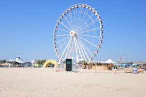 View of the ferris wheel from the free beach of Rimini