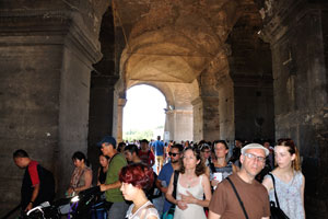 People are inside the Colosseum building