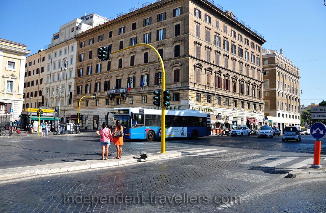 U. Giuliani Caffe is behind the bus