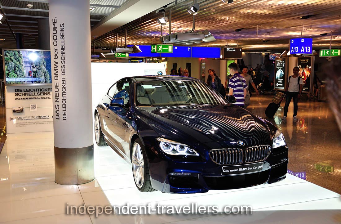 &ldquo;Das neue BMW 6er Coupe&rdquo; automobile is located near the Gate A13 in the FRA airport