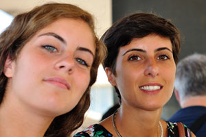 Good-looking young Italian ladies are on the Roma Termini railway station