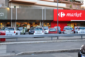 The parking is in front of Carrefour Market