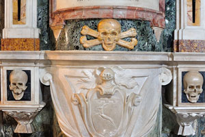 Skulls are in the bottom part of the monument to Alessandro Valtrini