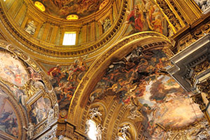 The dome and the ceiling are decorated by the Baciccia frescoes