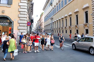 This intersection is between the streets of Via dei Condotti and Via del Corso
