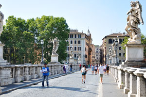 Tourists are on the Ponte Sant'Angelo bridge