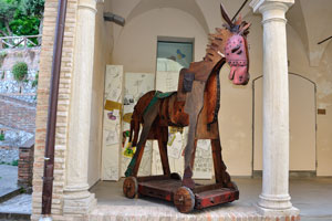 A funny wooden horse statue