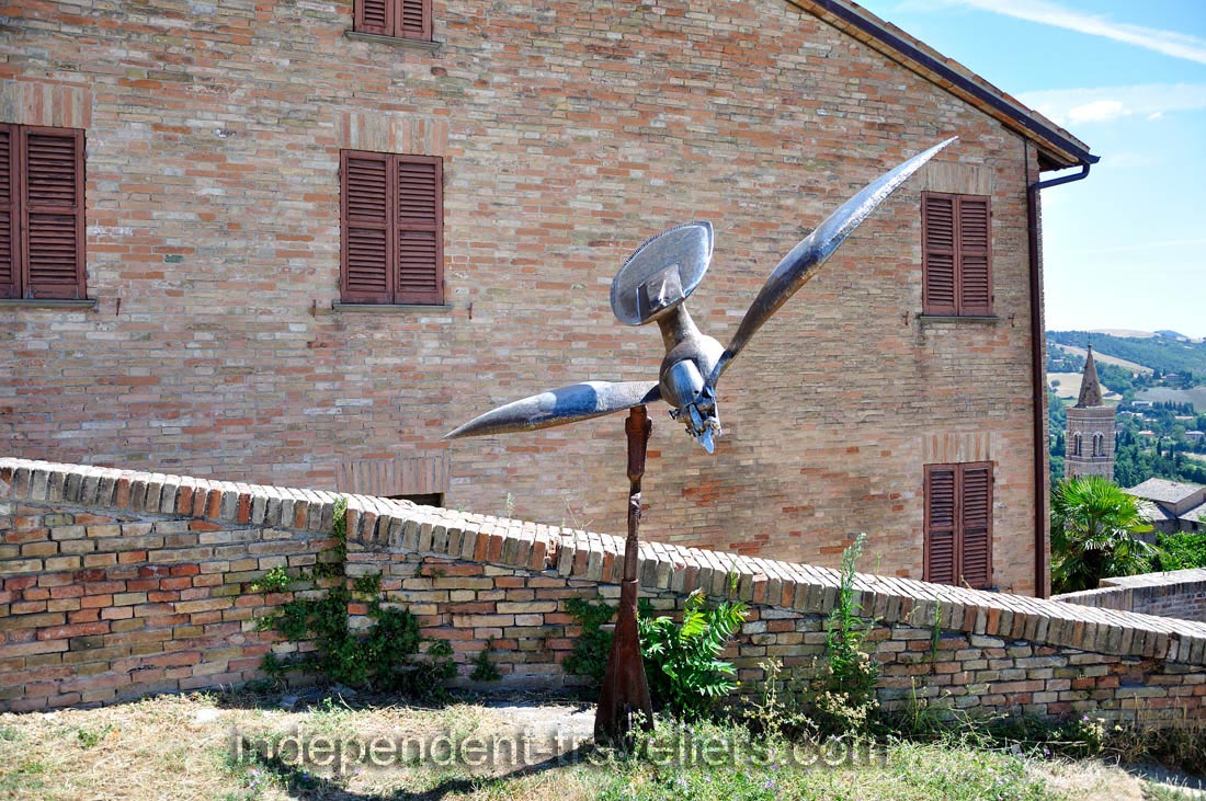 The metal bird sculpture is in Albornoz Fortress