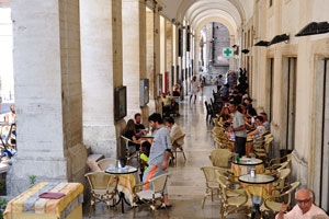 Outdoor coffee tables are under the roof of Collegio Raffaello
