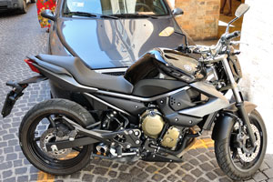 Yamaha motorcycle is on Corso Giuseppe Garibaldi street