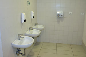 Wash basins are spotless in the toilet of Urbino bus station