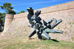 The huge metal monument is in Albornoz Fortress