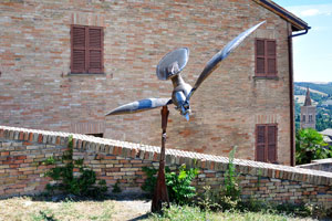 The metal bird sculpture is in Albornoz Fortress