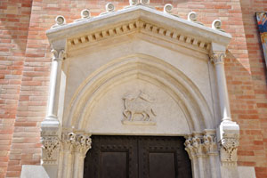 A paschal lamb is on “Oratorio di San Giovanni Battista” building
