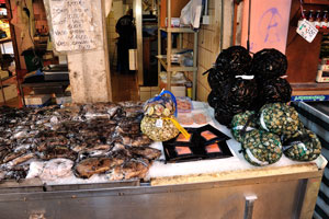 Cuttlefish and shellfish are on sale on the Rialto seafood market