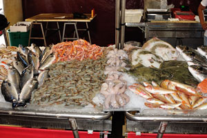 Different seafood species are on the counter