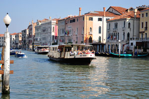 Vaporetto bus number VE 7688 is floating by Grand Canal