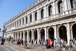 St Mark's Square is full of the tourists even early in the morning