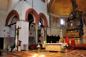 There are huge bones in the church of Santa Maria e San Donato behind the altar