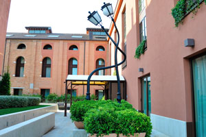 Curved street lights are located close to the Murano Museo vaporetto station on Riva Longa