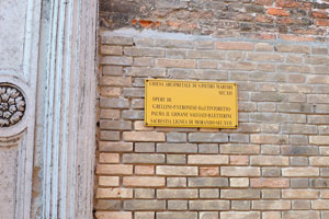 Inscription at the entrance to the church of San Pietro Martire on Murano