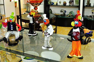 Clown glass miniatures inside the fascinating shop on Murano