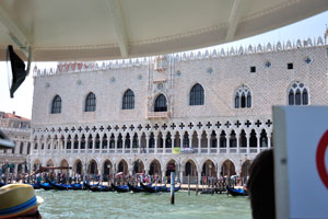 While our vaporetto bus floats we pass by the Doge's Palace