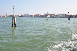 View of Venice from a vaporetto floating near the San Michele island