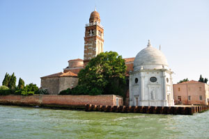 The architectural ensemble of the San Michele in Isola church from the water