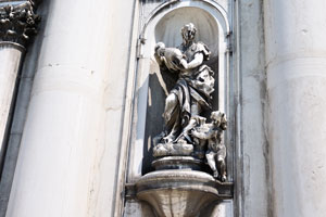 One of the statues at the entrance to the church of St. Mary of the Rosary