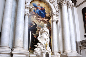 The sculpture by Giovanni Maria Morlaiter and the painting by Luca Giordano (1667) are inside Santa Maria della Salute