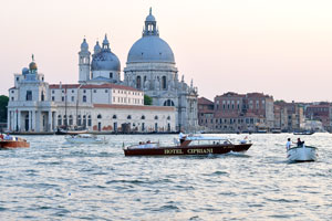 The motor boat which belongs to Belmond Hotel Cipriani moves across the Grand Canal