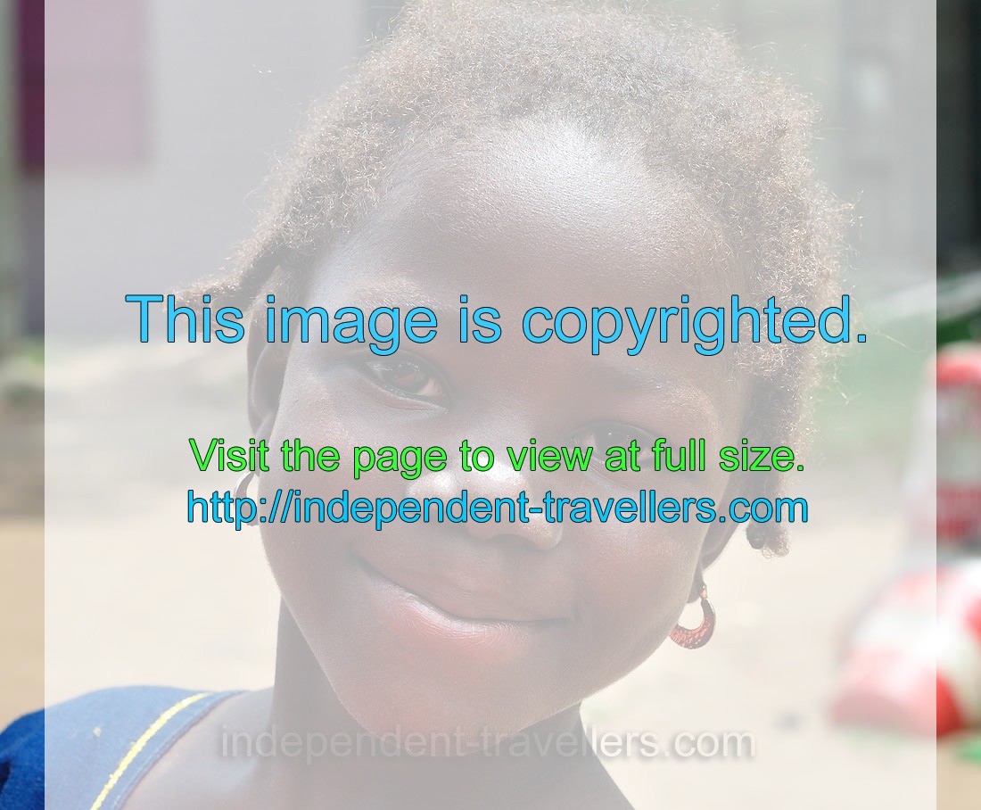 Little african girl smiles at me